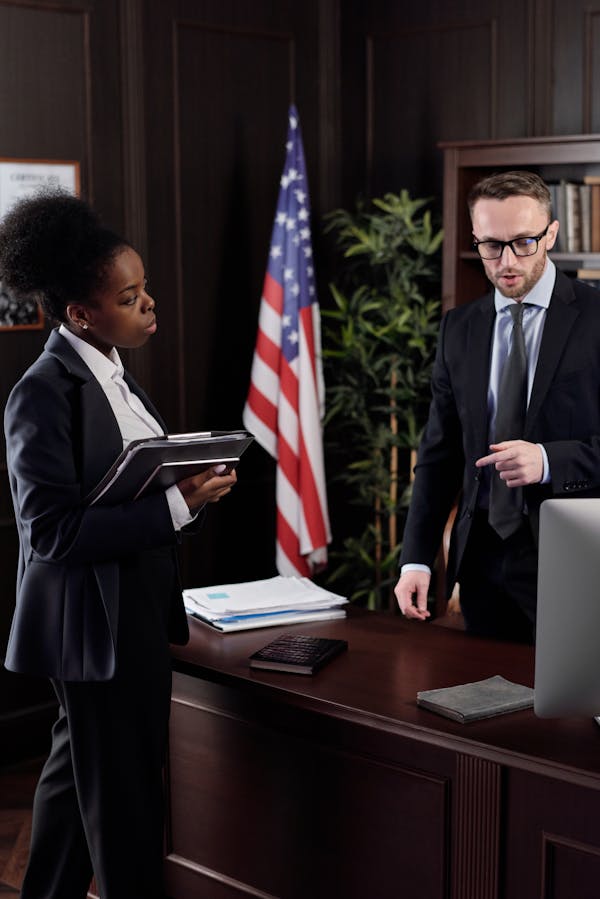 Lawyers Talking in an Office